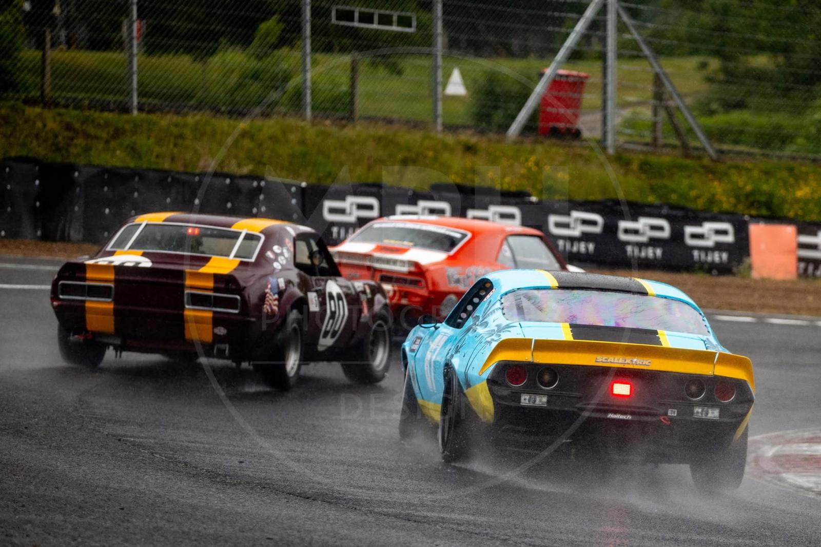 Coastal Motorsport Camaro racing in wet conditions