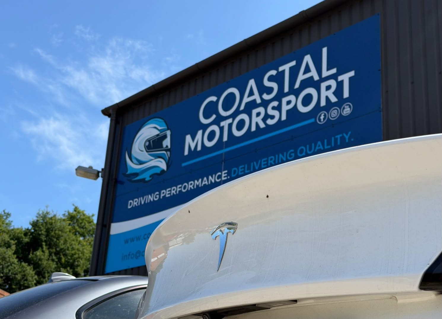 Tesla at Coastal Motorsport workshop