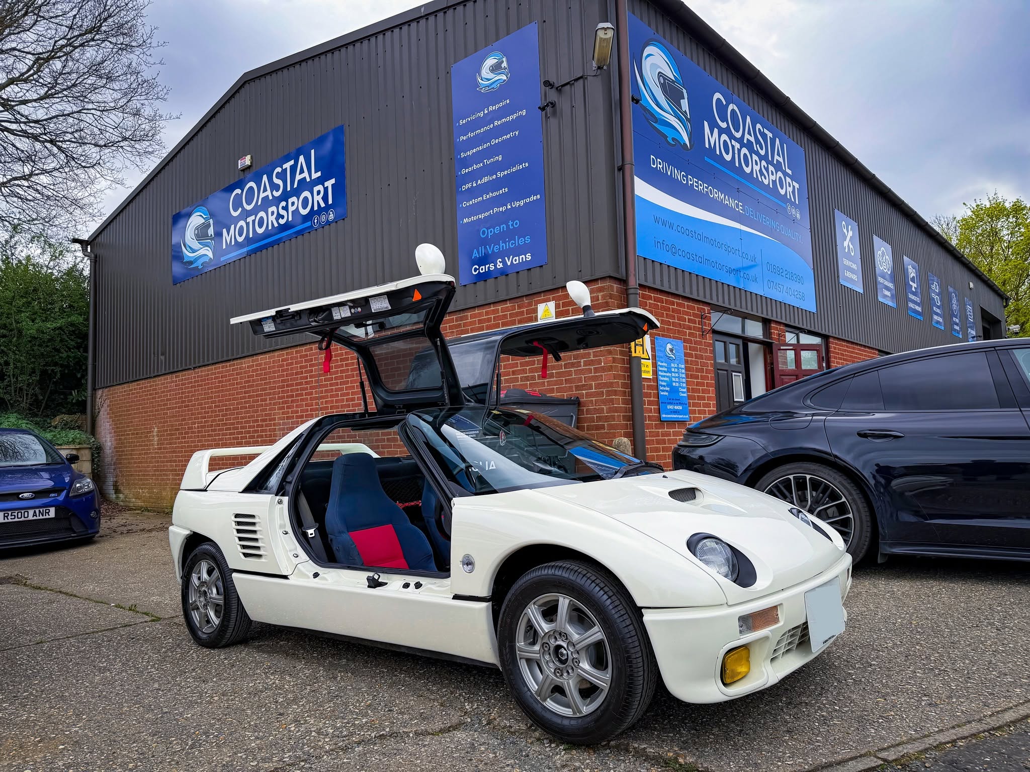 Sports car outside Coastal Motorsport workshop